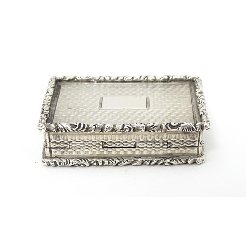 448 - A William IV silver vinaigrette with engine turned decoration and gilded interior hallmarked Birming... 