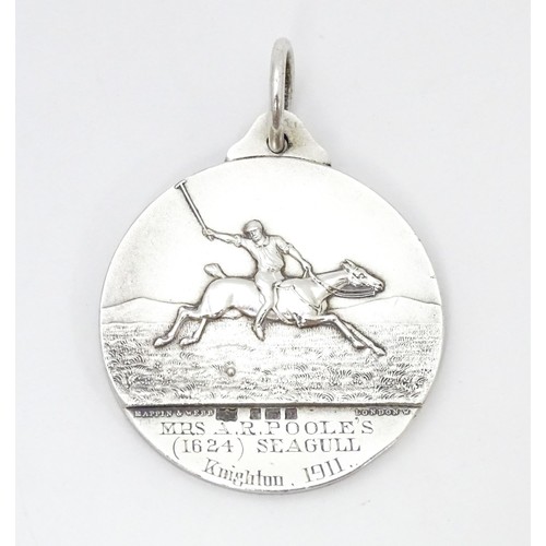 468 - A silver medal / medallion form the Polo & Riding Pony Society, with relief horse detail, bearing th... 