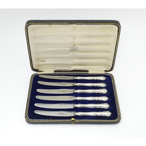 513 - Scandinavian silver : A set of six Danish silver handled tea knives. Marked 830S, with three tower m... 