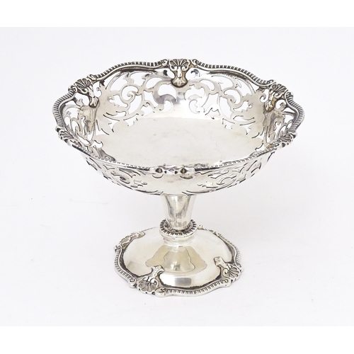 582 - A pedestal bon bon dish. Hallmarked London 1918 maker Mappin & Webb Ltd . Approx 2 3/4