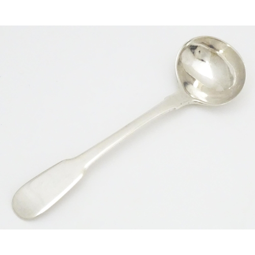 588 - A silver fiddle pattern salt spoon hallmarked Dublin 1821 maker IB possibly James Brady. Approx 4