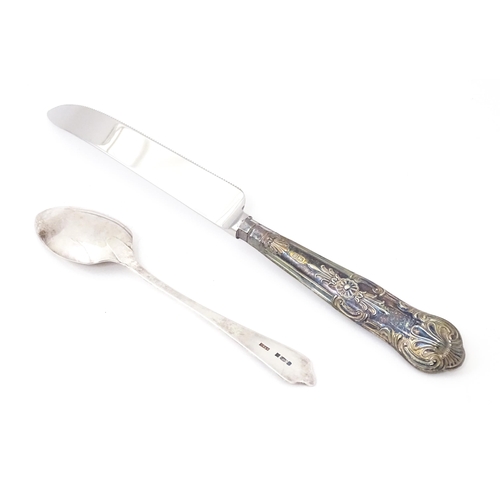 590 - A silver handled Grapefruit knife hallmarked Sheffield 1977 maker Harrison Brothers together with a ... 