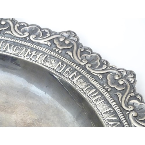 596 - A Greek Orthodox white metal ecclesiastical charger / paten / offertory plate depicting St Nicholas ... 