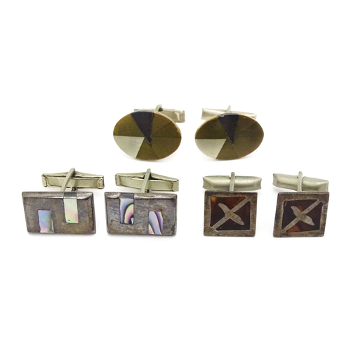 700 - A leather stud box containing assorted cufflinks etc, to include Mexican silver cufflinks with abalo... 