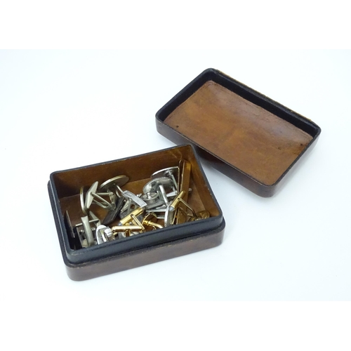 700 - A leather stud box containing assorted cufflinks etc, to include Mexican silver cufflinks with abalo... 