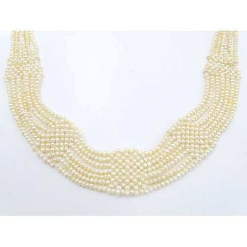 701 - Five various pearl necklaces, to include examples with silver clasps/ (5)