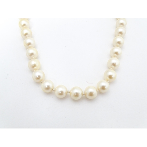 701 - Five various pearl necklaces, to include examples with silver clasps/ (5)