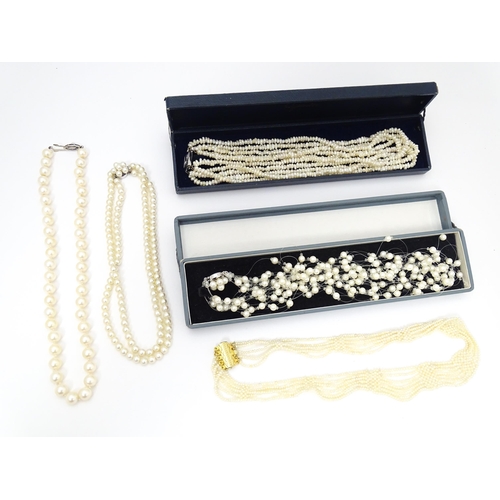 701 - Five various pearl necklaces, to include examples with silver clasps/ (5)