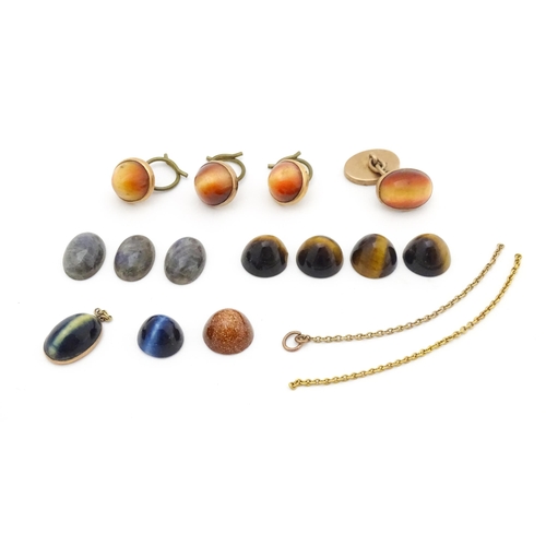 728 - Assorted studs etc set with tigers eye together with loose tigers , cats eye, gold stone etc