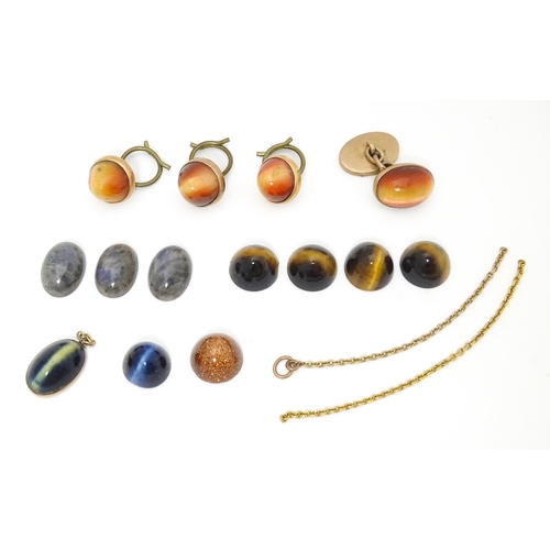 728 - Assorted studs etc set with tigers eye together with loose tigers , cats eye, gold stone etc