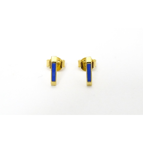 732 - A pair of Astley Clarke 925 silver gilt stud earrings with blue enamel detail. Approx. 1/4