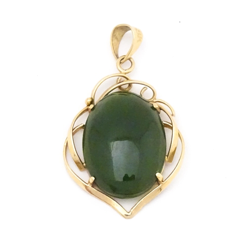 742 - A yellow metal pendant set with green stone cabochon. Together with a pair of 9ct gold pearl earring... 