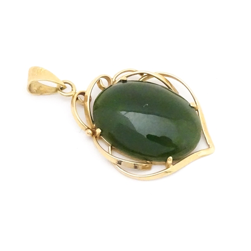 742 - A yellow metal pendant set with green stone cabochon. Together with a pair of 9ct gold pearl earring... 