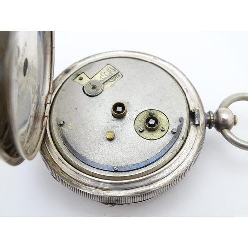 758 - A Swiss .925 silver pocket watch, the white enamel dial with subsidiary seconds dial at 6, signed  '... 