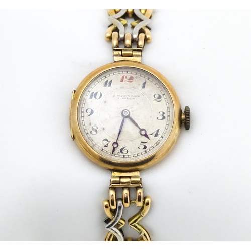 768 - A c.1925 9ct gold cast ladies wristwatch, the dial with engraved decoration, Arabic numerals and sig... 