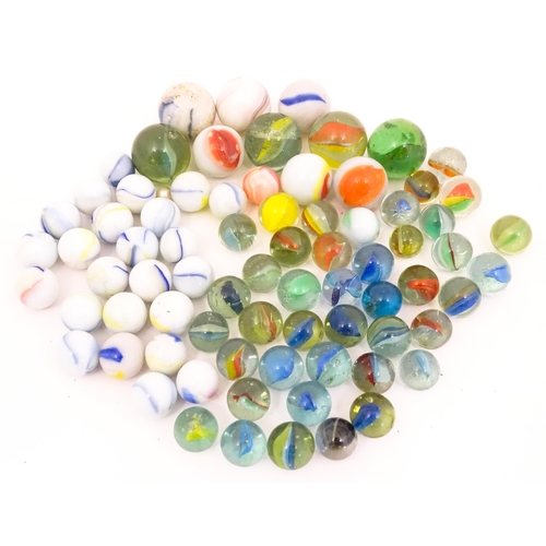 837 - Toys: A quantity of marbles, many with colours twists, etc. Largest approx. 1