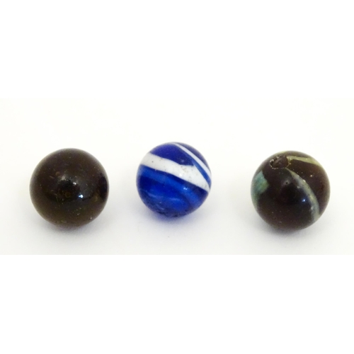 838 - Toys: A quantity of marbles, many with colours twists. Largest approx. 1 3/4