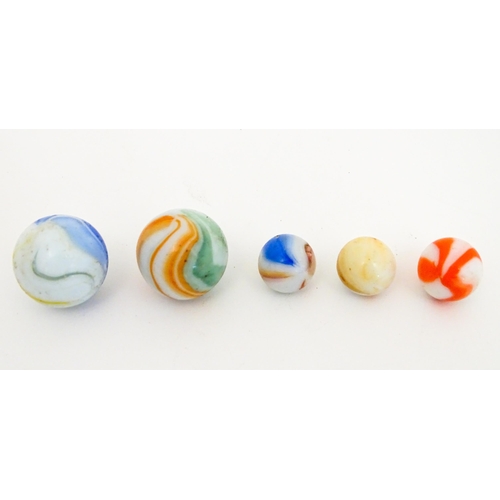 838 - Toys: A quantity of marbles, many with colours twists. Largest approx. 1 3/4