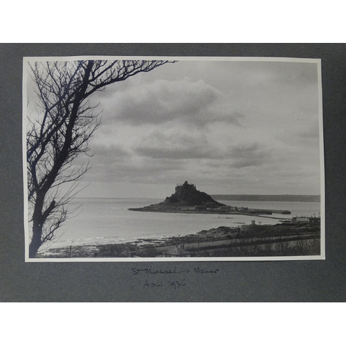 990 - An early 20thC travel photograph album depicting various British and European destinations, to inclu... 