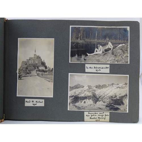 990 - An early 20thC travel photograph album depicting various British and European destinations, to inclu... 