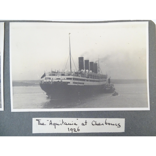 990 - An early 20thC travel photograph album depicting various British and European destinations, to inclu... 