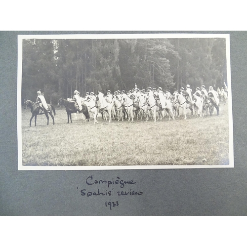 990 - An early 20thC travel photograph album depicting various British and European destinations, to inclu... 