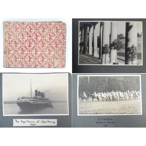 990 - An early 20thC travel photograph album depicting various British and European destinations, to inclu... 