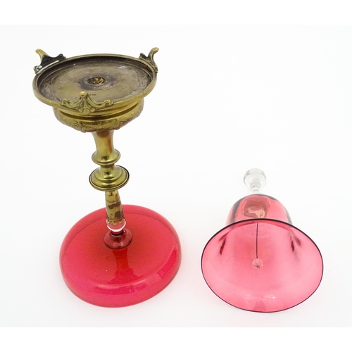 215 - A cranberry clear glass bell together with a glass tazza the base formed as an epergne / centrepiece... 