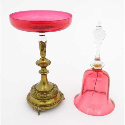 215 - A cranberry clear glass bell together with a glass tazza the base formed as an epergne / centrepiece... 