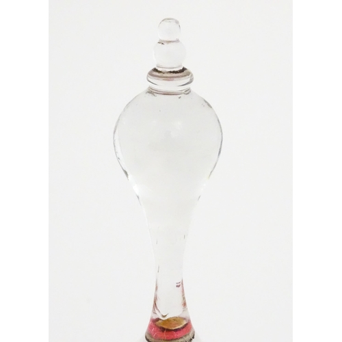 215 - A cranberry clear glass bell together with a glass tazza the base formed as an epergne / centrepiece... 