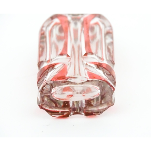 228 - A Bohemian glass scent / perfume bottle with red detail and a Continental silver gilt lid. Approx. 3... 