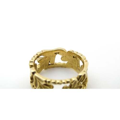 627 - A 9ct gold ring with oak leaf detail. Ring size approx. K