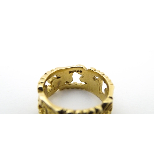 627 - A 9ct gold ring with oak leaf detail. Ring size approx. K