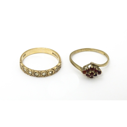 650 - A 9ct gold ring set with garnets. Ring size approx. Q. Together with a 9ct gold ring set with white ... 