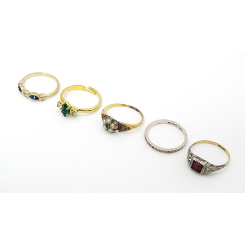 651 - Five assorted rings to include to include a silver and gold example (5)