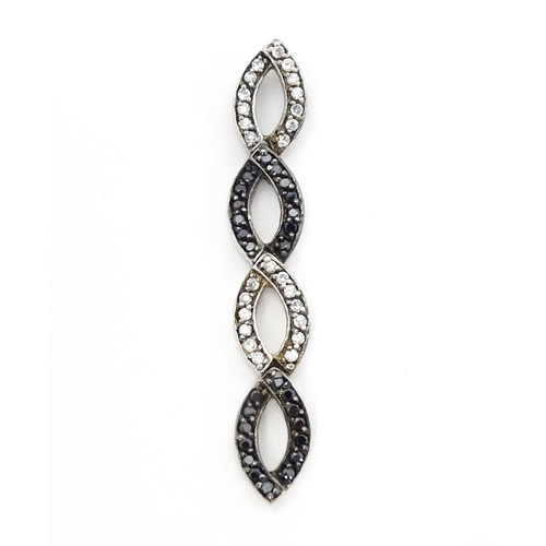 654 - A silver ring set with marcasite detail. Together with a silver pendant. Pendant approx. 2