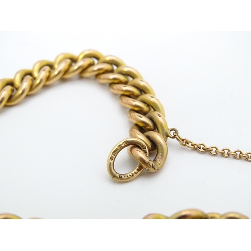 661 - A gold plated bracelet by Pioneer with patent no. 137868, with heart shaped padlock clasp.