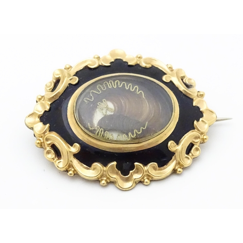 673 - Mourning / Memorial jewellery: Three items of 19thC mourning jewellery to include a yellow metal and... 