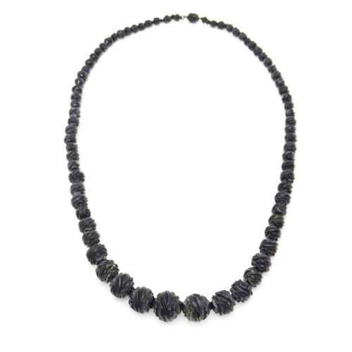 680 - A Victorian Whitby Jet bead necklace. Approx. 32