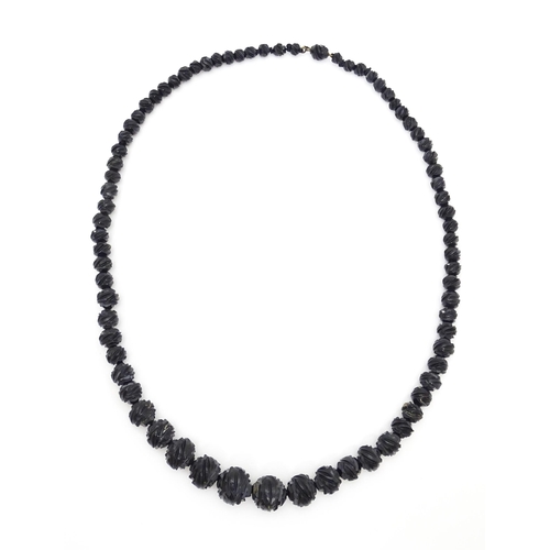 680 - A Victorian Whitby Jet bead necklace. Approx. 32