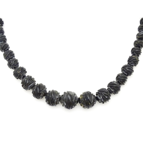 680 - A Victorian Whitby Jet bead necklace. Approx. 32