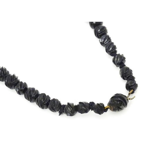 680 - A Victorian Whitby Jet bead necklace. Approx. 32