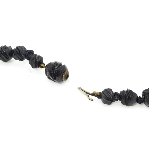 680 - A Victorian Whitby Jet bead necklace. Approx. 32