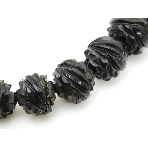 680 - A Victorian Whitby Jet bead necklace. Approx. 32