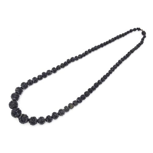 680 - A Victorian Whitby Jet bead necklace. Approx. 32