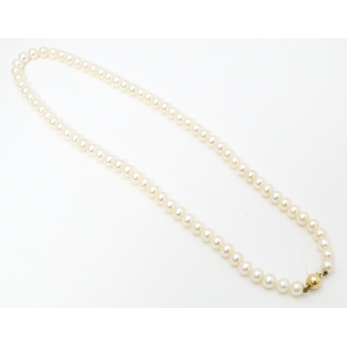 683 - A pearl necklace with 9ct gold clasp. Approx. 16