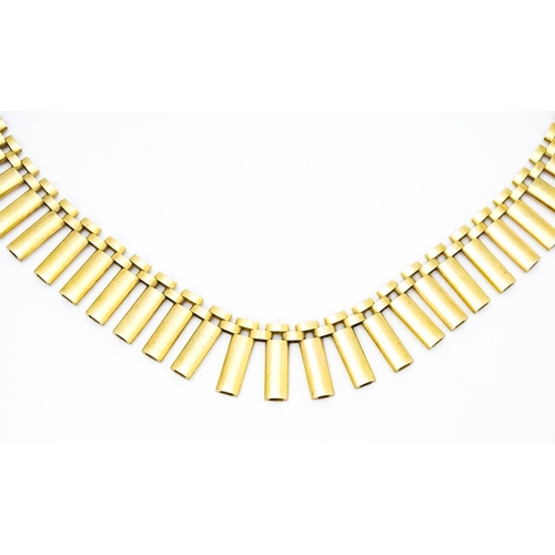 685 - A 9ct gold necklace formed as a Cleopatra collar. Approx 16