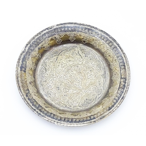 434 - An Egyptian silver pin dish together with a silver teaspoon hallmarked Sheffield 1930 and a white me... 