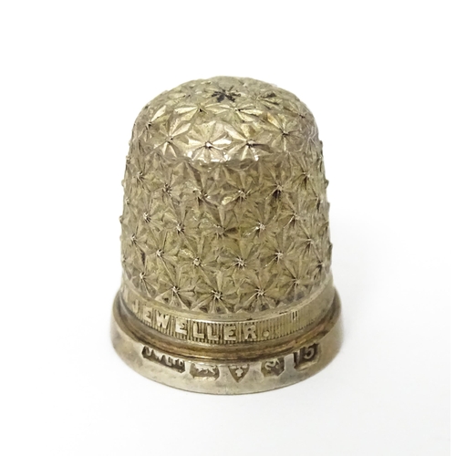 439 - Three thimbles to include two silver examples, one hallmarked Chester 1896 maker Henry Griffith & So... 