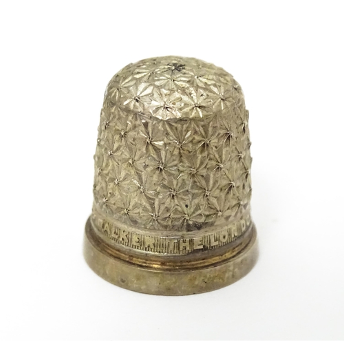 439 - Three thimbles to include two silver examples, one hallmarked Chester 1896 maker Henry Griffith & So... 